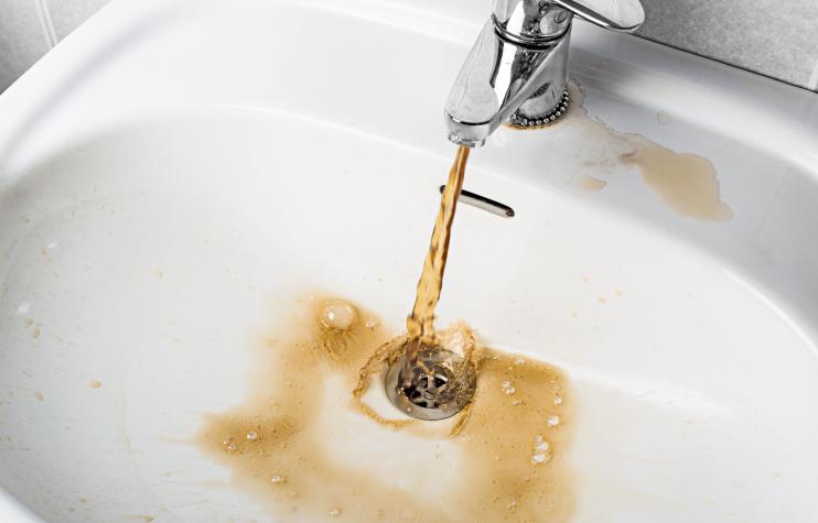 https://threetsplumbing.com/wp-content/uploads/rusty-water-flowing-from-tap.jpg